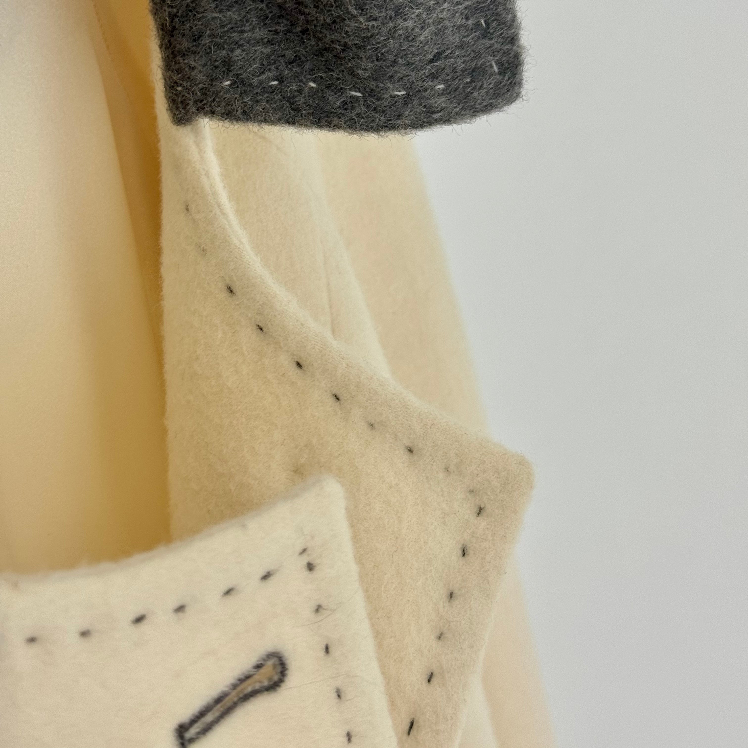 HAND-FINISHED STITCHING